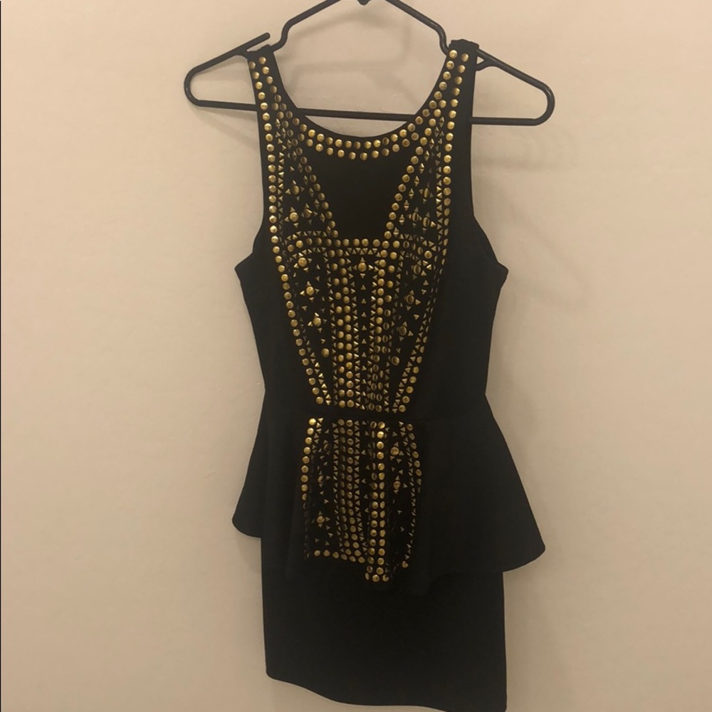 Black peplum studded dress